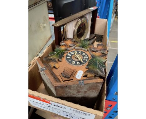 A cuckoo clock and a mid 20th century Metamec mantle clock. 