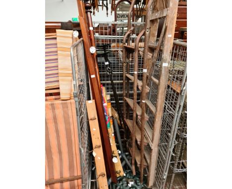 A mixed lot to include wooden and metal step ladders, metal candle stands, coat hooks, curtain rail etc. 
