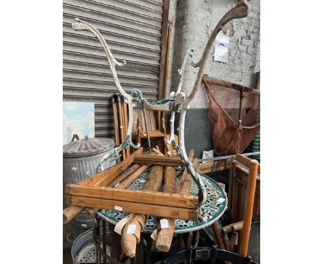 A wooden handle for garden tool, an axe handle, a stool frame - no canvas and two smoker / drying supports. 