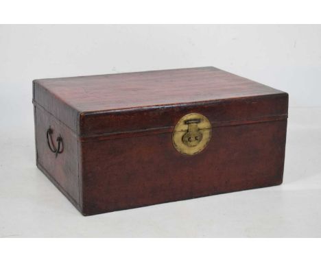 Chinese trunk with gilt metal mounts and carrying handles, 80cm x 57cm x 35cm high