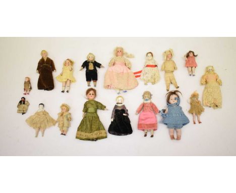 Collection of antique bisque and composite head miniature dolls, together with a small tabletop tin trunk, 20cm x 14cm x 10cm