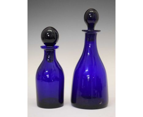 Thomas Webb blue glass mallet shaped decanter, 27cm high, together with a similar smaller decanter (2)
