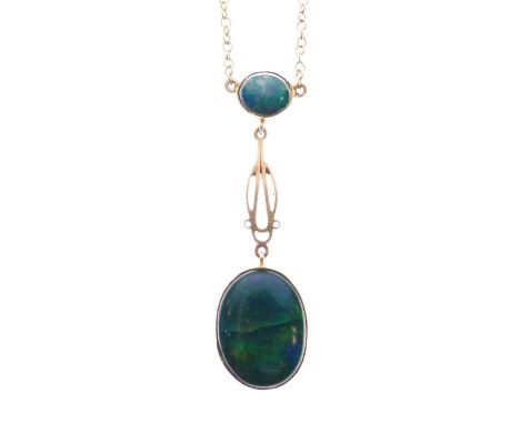 Yellow metal (9ct) and black opal pendant with oval drop (approx 15mm x 11mm), overall 40mm approx, with belcher-link necklac
