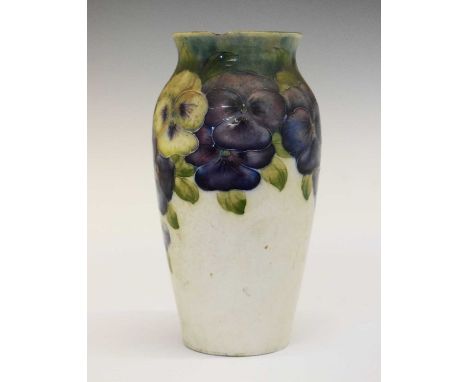 William Moorcroft Pansy pattern baluster vase, signed with 'Macintyre Burslem' mark to base, 18cm high (chips) 