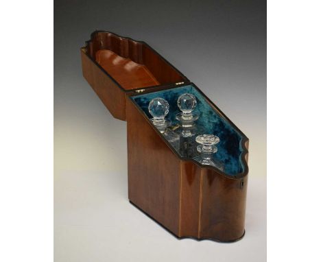 19th Century mahogany serpentine knife box converted into a decanter holder with three glass decanters, 38cm high 