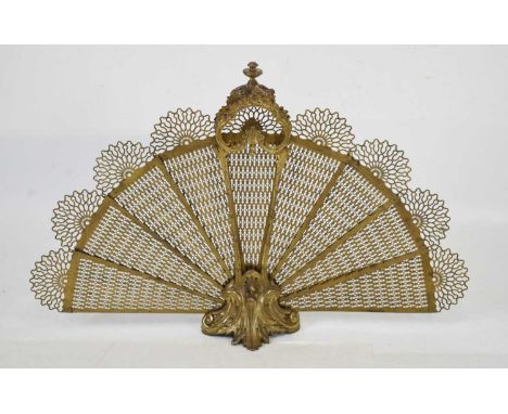 Cast brass Edwardian style peacock fan firescreen raised on cast acanthus leaf base, 102cm x 65cm high