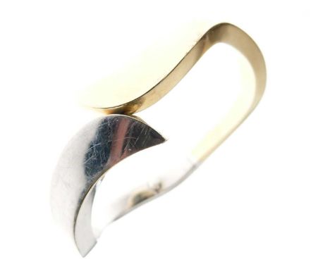 Yellow metal (585) bangle, of Modernist design and wavy two-part form, stamped 'model 585', 22.4g gross approx