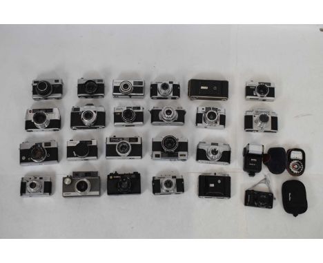 Group of twenty various branded vintage cameras to include; Kodak, Canonet 28, Voigtländer, Konica, Agfa, etc., all with lens