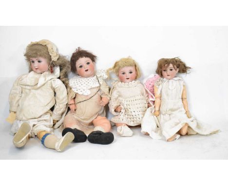 Four early 20th Century German bisque head dolls to include Handwerck and Armand Marseille, all with sleeping glass eyes and 