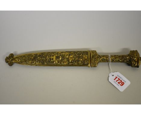 A rare Spanish Albacete dagger, having pierced 16.5cm blade, with ornate gilt metal handle and scabbard. 