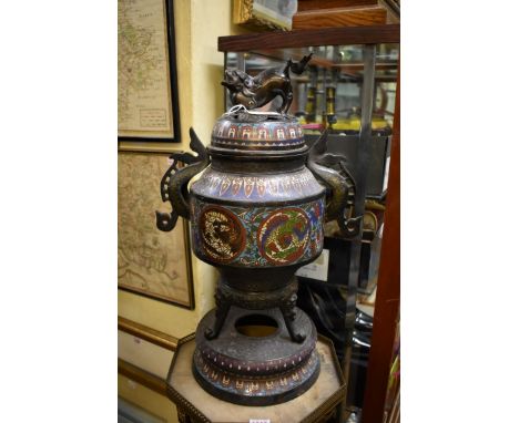 A large Chinese cloisonne enamel twin handled tripod censor and cover,&nbsp;54cm high. 