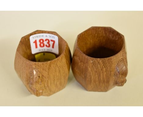 A pair of Robert 'Mouseman' Thompson oak octagonal napkin rings,&nbsp;5cm. 