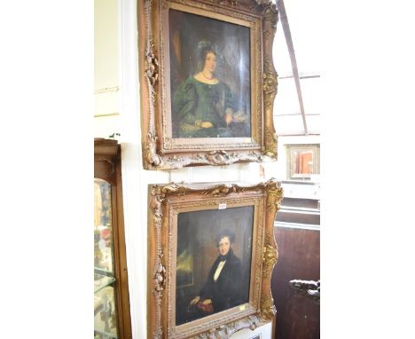 English School, first half 19th century, half length seated portraits of a lady and gentleman, a pair, oil on canvas, 42.5 x 
