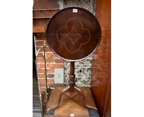 A George III mahogany and inlaid circular tilt top tripod table, 43.5cm wide. 