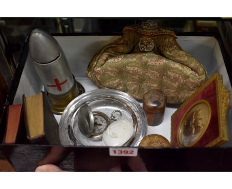 A mixed lot,&nbsp;to include a Trench Art money box; and a World War I period pocket compass.&nbsp; 