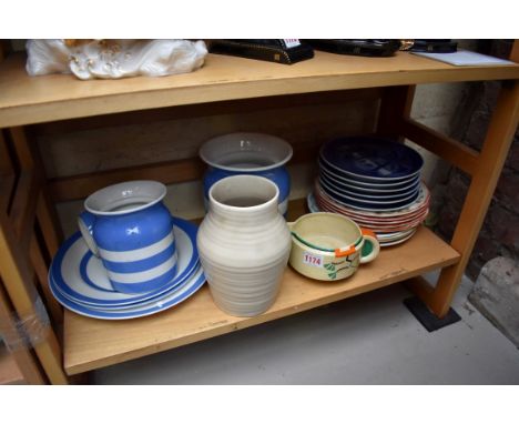 A mixed group of pottery and porcelain, to include: Cornishware; a Clarice Cliff 'Ravel' pattern sauce boat, (chipped); Royal