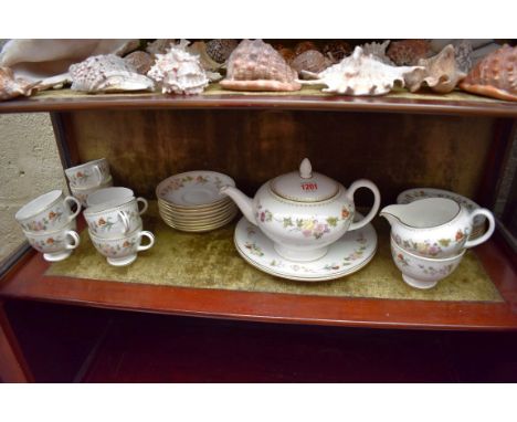 A Wedgwood 'Mirabelle' pattern eight piece tea service, (lacking one cup). 
