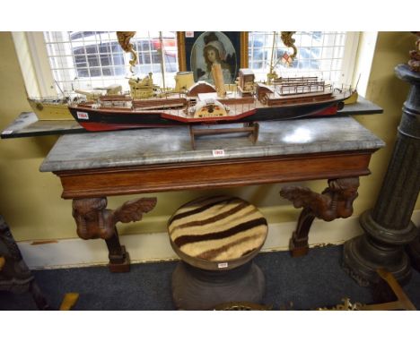An antique carved oak and grey marble console table,&nbsp;with figural supports, 101cm wide. 