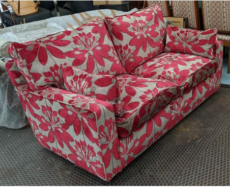 DAVID SEYFRIED SOFA, with floral red patterned upholstery, 175cm L x 78cm H. 