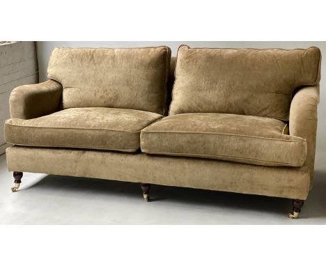 SOFA, Howard style golden plush velvet upholstered with twin seat and back cushion, square tapering supports with castors, 20