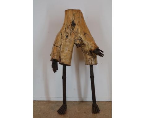 Tree trunk man, sculpture in wood and iron, h. 145 cm.Boomstronk-man, sculptuur in hout en ijzer, h. 145 cm.