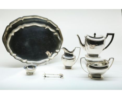 Dutch silver tea service and two silver trays, a silver tea  strainer and sugar tongs, teaservice: mm Van Kempen, Voorschoten