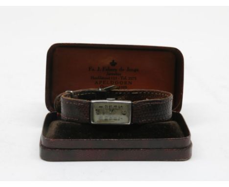 Lady's wrist watch with silver rectangular case and brown leather  crocodile print band, in original case, ca. 1920's, manual