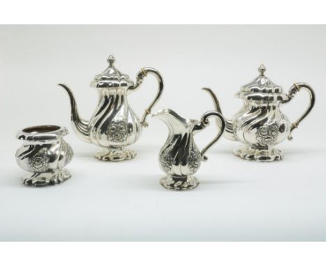 Silver tea and coffee service with twisted lobbed foot and body,  with floral decoration, retailer mark S&amp;F, Germany, 925