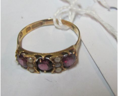 A 15ct gold almandine garnet and seed pearl ring 1.8g