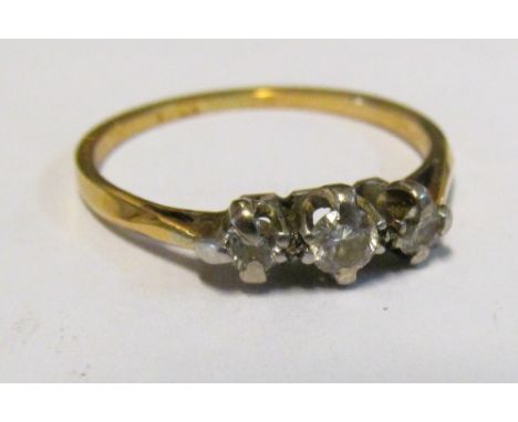 A ring three stones