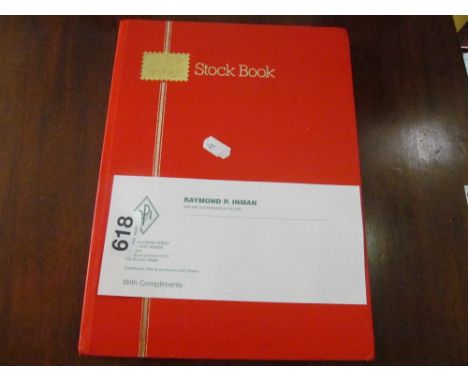 A stock book and stamps