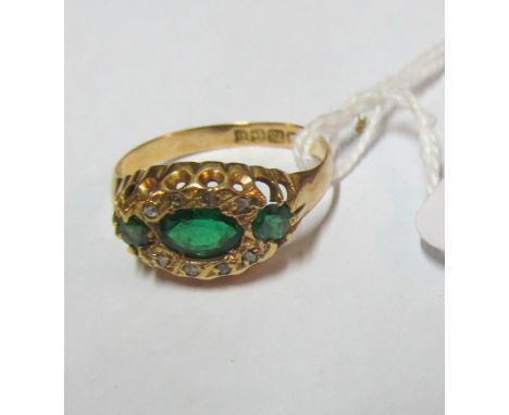 An 18ct gold green garnet dublet and diamond ring 3g