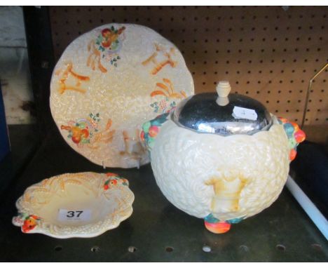 A Clarice Cliff Celtic Harvest lidded bowl, plate and dish