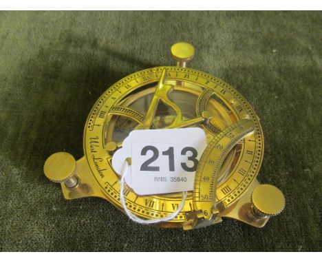 A modern brass compass sundial