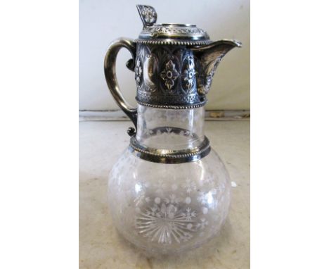 A claret jug with silver neck and lid Engraving on top as photographed UNIVERSITY ATHLETIC CLUB QUARTER MILE HANDICAP 29 ENTE