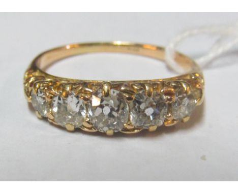 An 18ct gold five stone diamond ring 2.9g