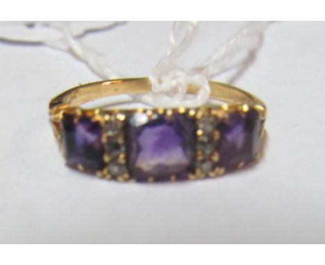 A gold amethyst and diamond chip ring 2.8g