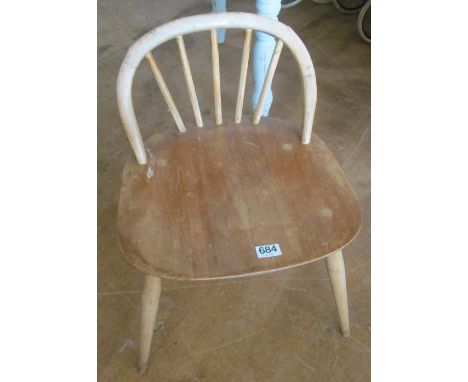 An Ercol dressing table stool with arched chair back (s/a/f)