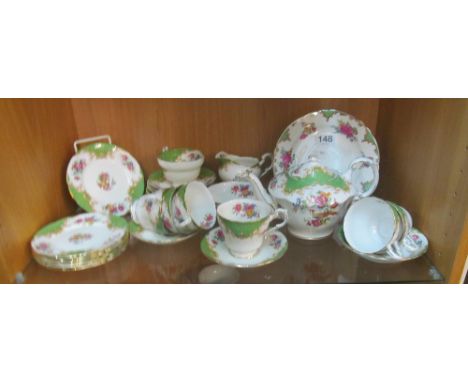 A part Paragon teaset:- cup and saucer, six cups and eight saucers, six tea plates, sucrier, jug and teapot and an Aynsley pl