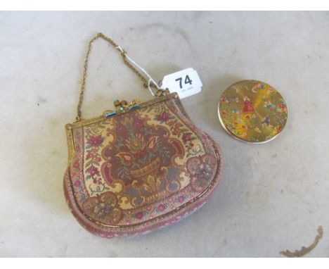A tapestry effect evening bag and a Romeo and Juliet compact