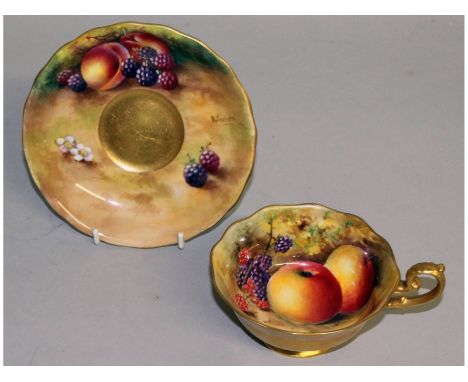 A Royal Worcester fruit painted scallop edged teacup and saucer, both signed by E. Townsend and W. Bee,  puce mark.
