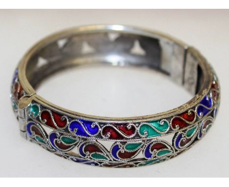A silver and enamel .84 mark Plique bangle.