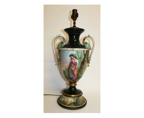 A 19th century Paris porcelain two handled urn shaped lamp, painted with a continuous scene of a young girl in a landscape se