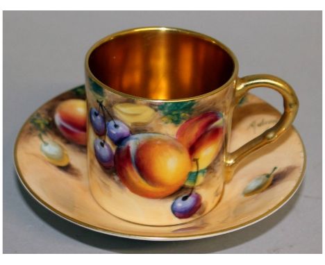 A Royal Worcester fruit painted coffee can and saucer, both signed by Roberts, black mark.