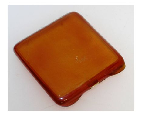 A small blonde tortoiseshell cigarette case, with gold fittings. 6cms x 7cms.