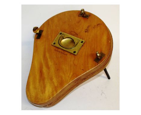 A rare wooden "Old England Paris" tennis racket press.
