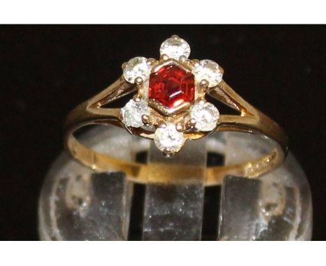 A ruby and diamond ring.