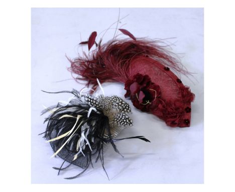 Hesti Hats, a comb hat with feathers and a Manhattan red handmade hat.