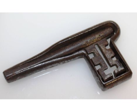 A rare 17th century steel fold away key. 9cms closed, 15.5cms open.