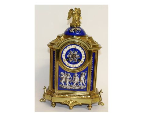 A superb 19th century French ormolu and porcelain clock, with Old Father Time finial, blue and white porcelain panels with cu